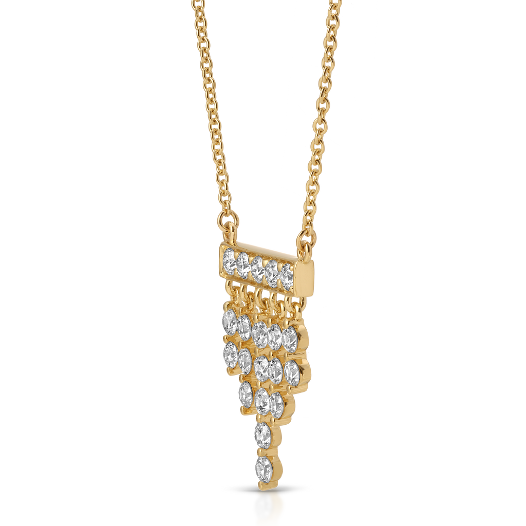 Gold necklace with a diamond pendant on a white background
