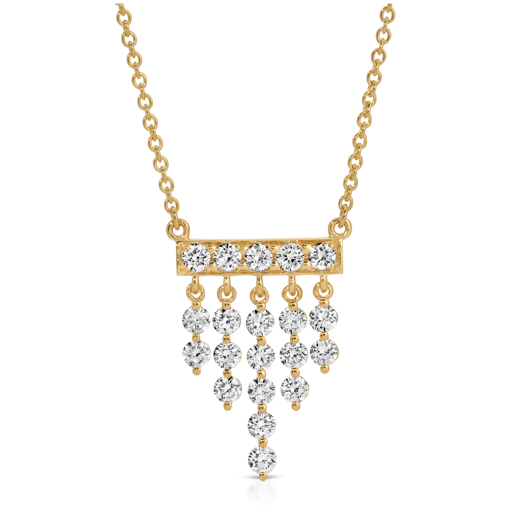 Gold necklace with diamond pendants on a white background