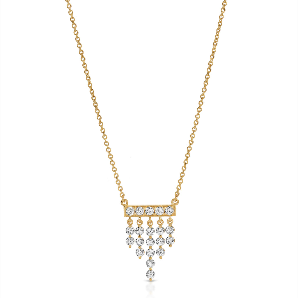 Gold necklace with diamond pendants on a white background