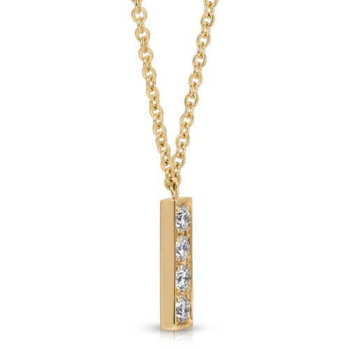 Gold necklace with a bar-shaped pendant featuring three diamonds on a white background