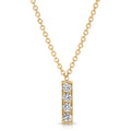 Gold necklace with a bar pendant featuring three diamonds on a white background