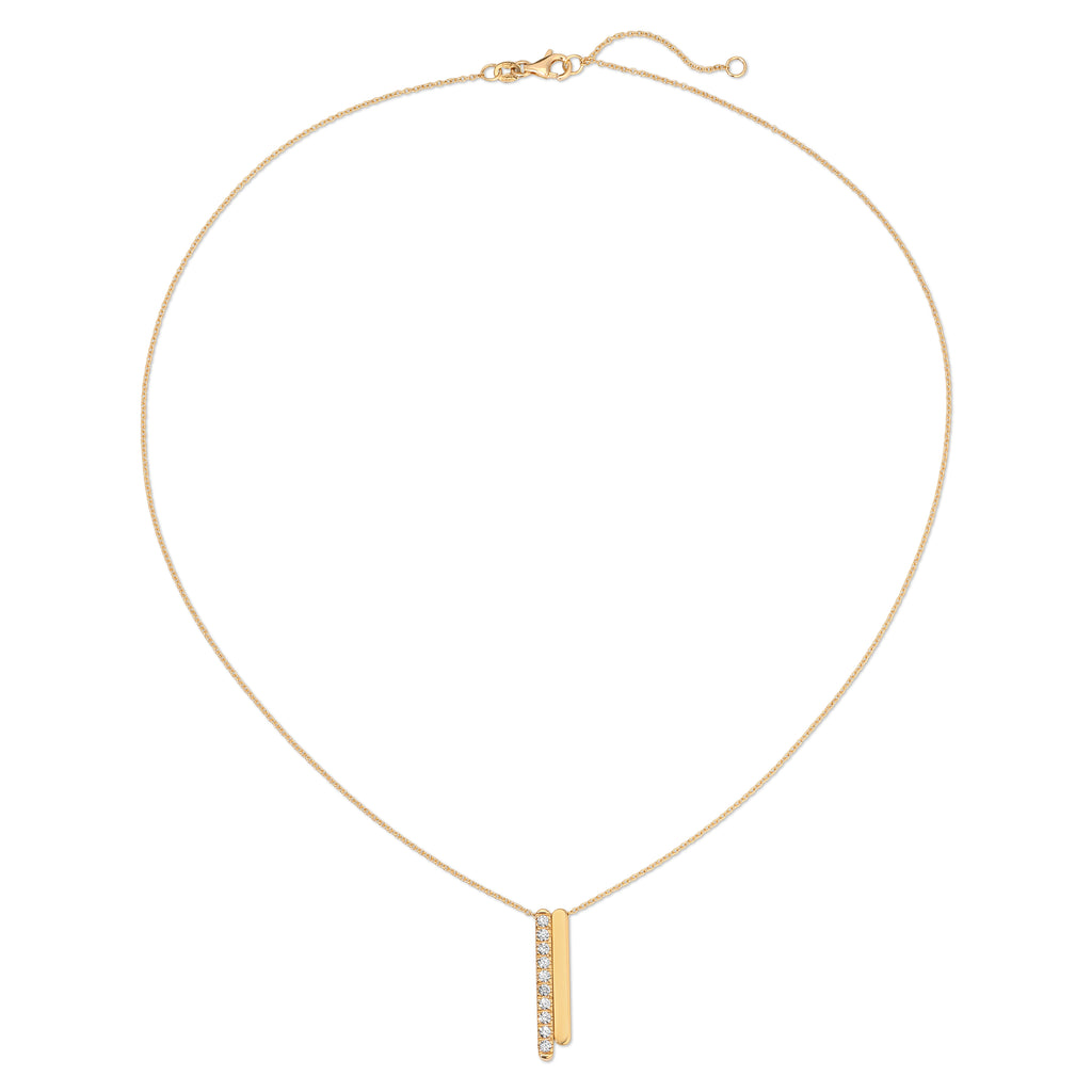 Gold necklace with a small pendant on a white background