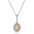 Necklace with a pendant featuring a yellow gemstone and diamond accents on a white background