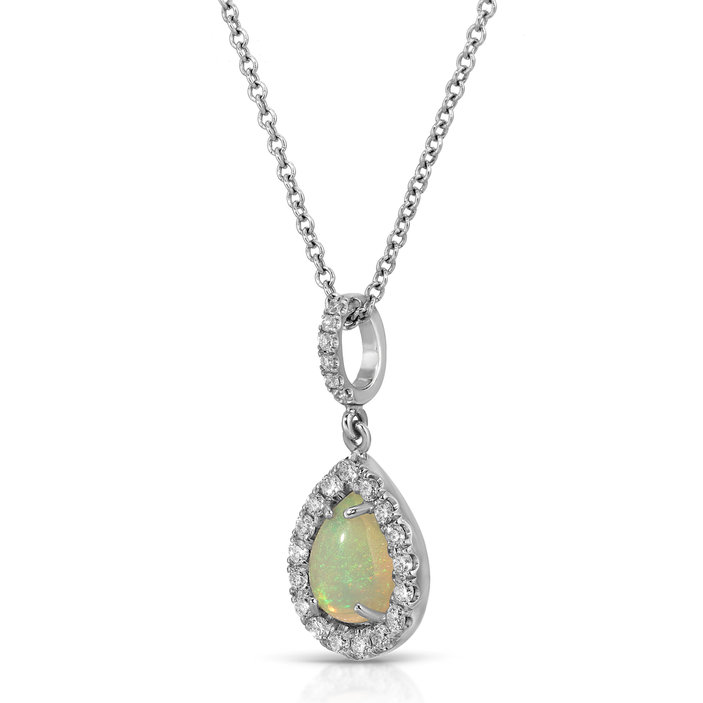 Opal pendant necklace with chain on a white background
