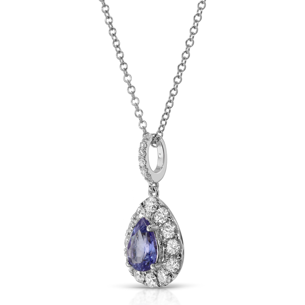 Diamond and purple gemstone pendant on a chain against a white background