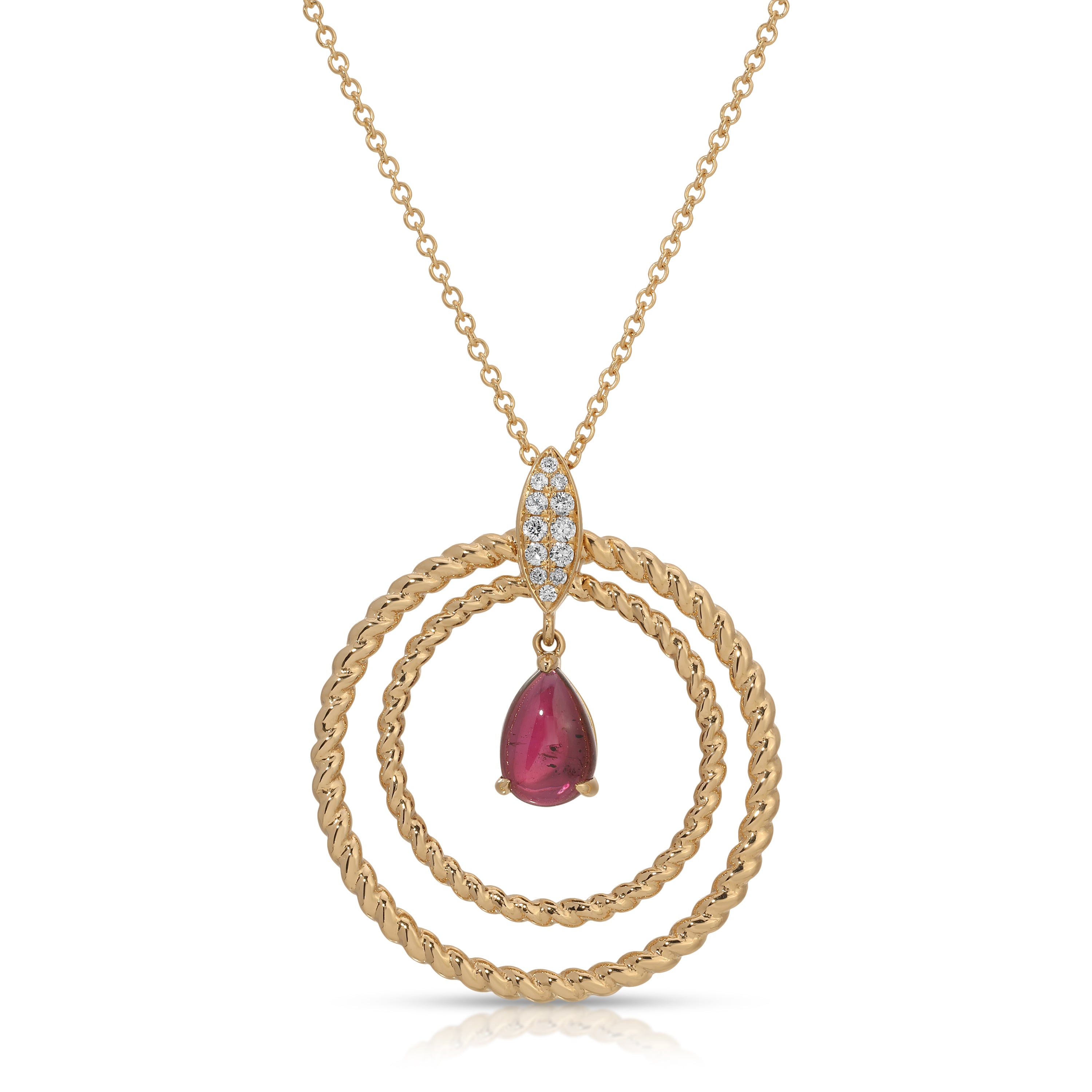 Gold necklace with a red gemstone pendant on a white background