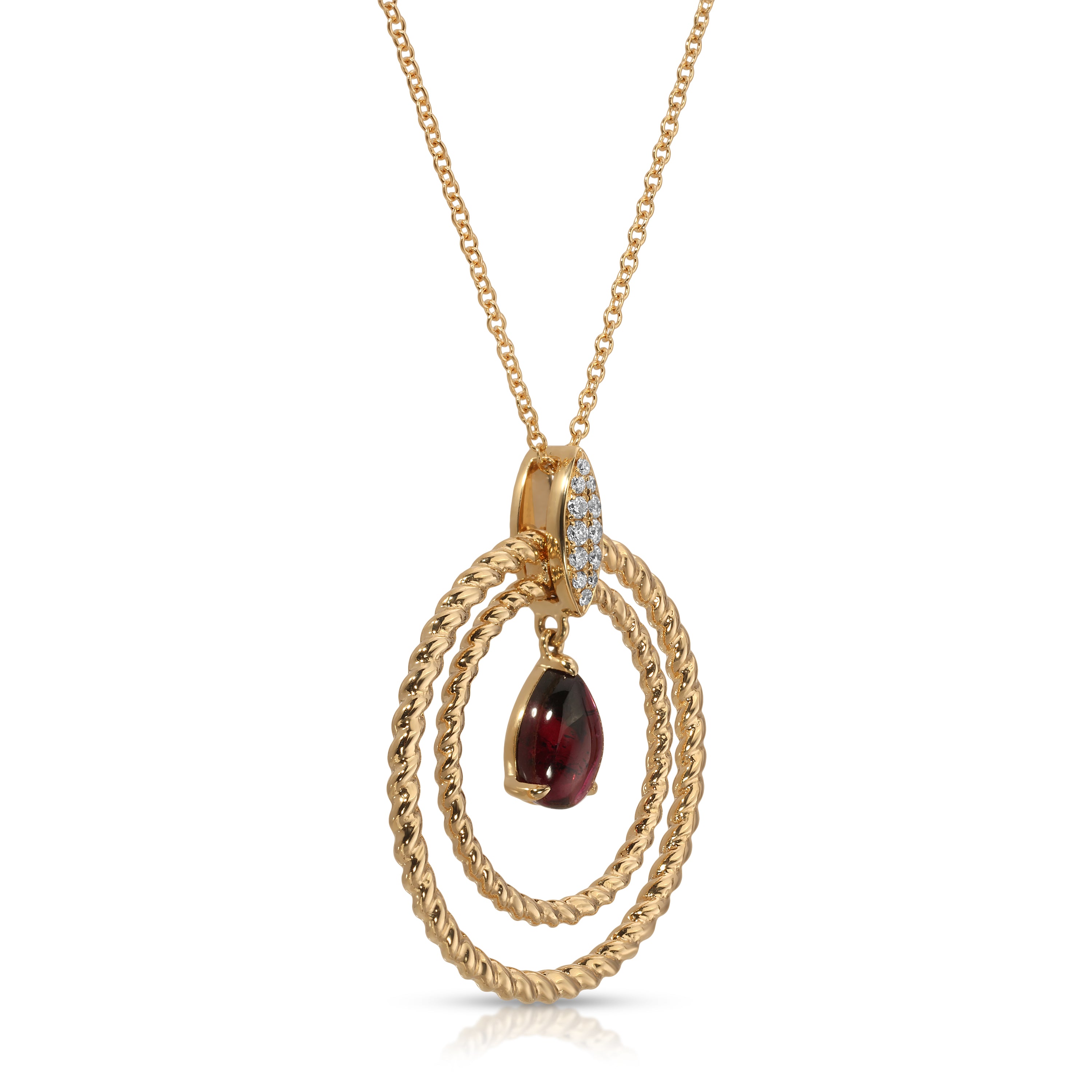 Gold necklace with a pendant featuring a red gemstone on a white background