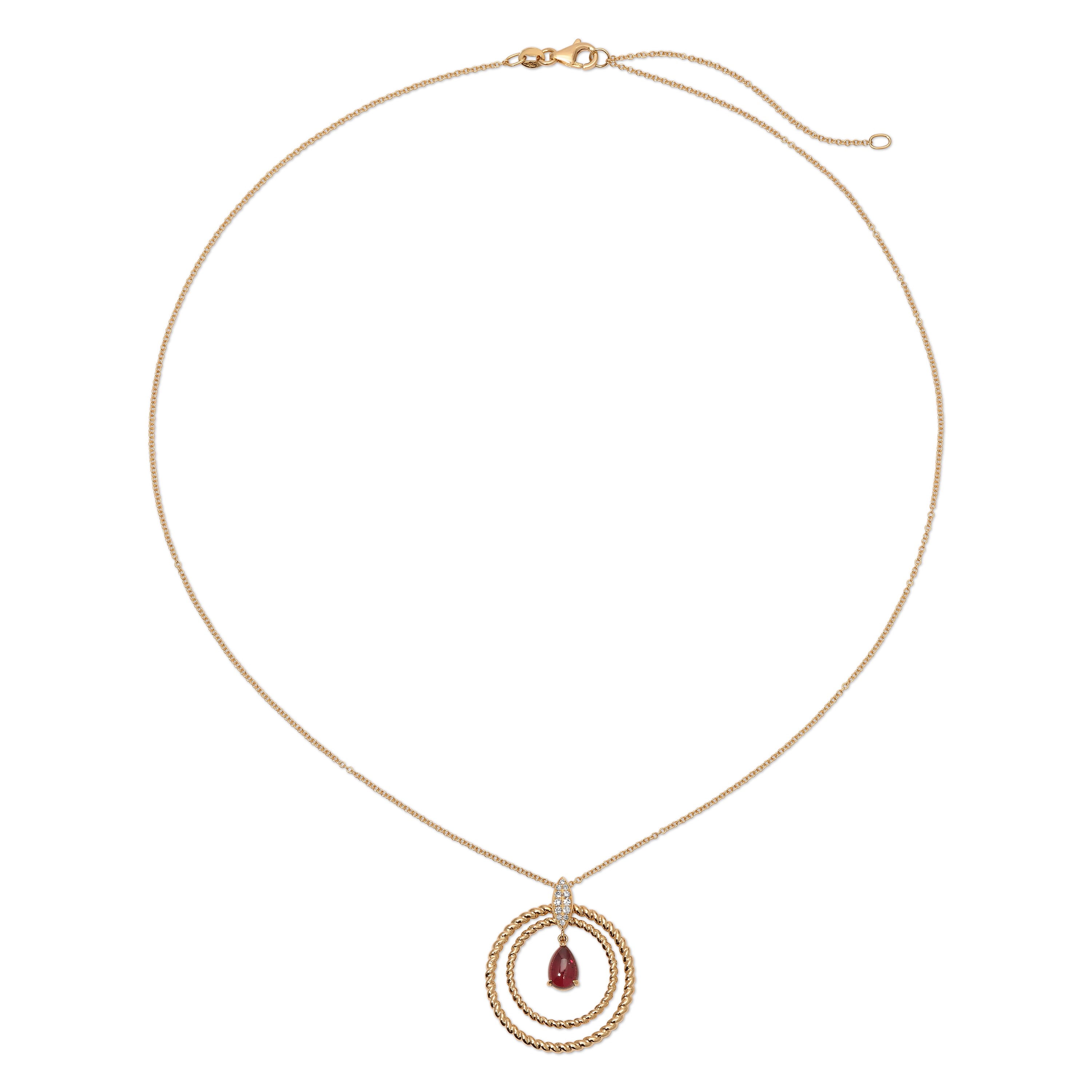 Gold necklace with a circular pendant featuring a red gemstone on a white background