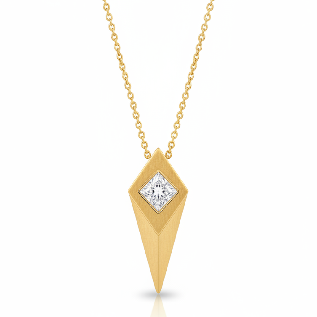 A gold pendant necklace featuring a faceted, diamond-shaped gold geometric pendant with a clear round-cut gemstone at its center, suspended from a delicate gold chain against a plain white background.