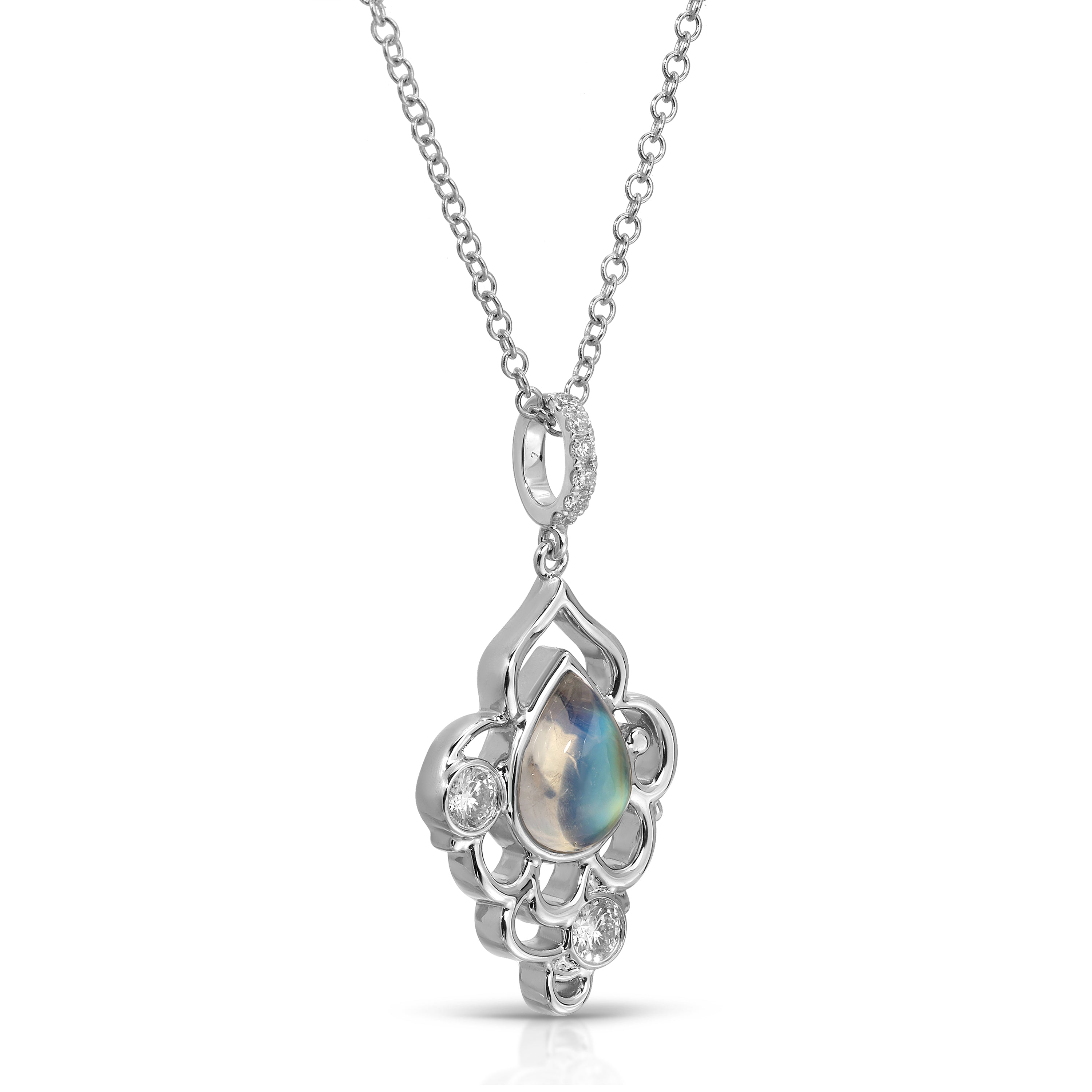 Silver pendant with a central gemstone on a white background