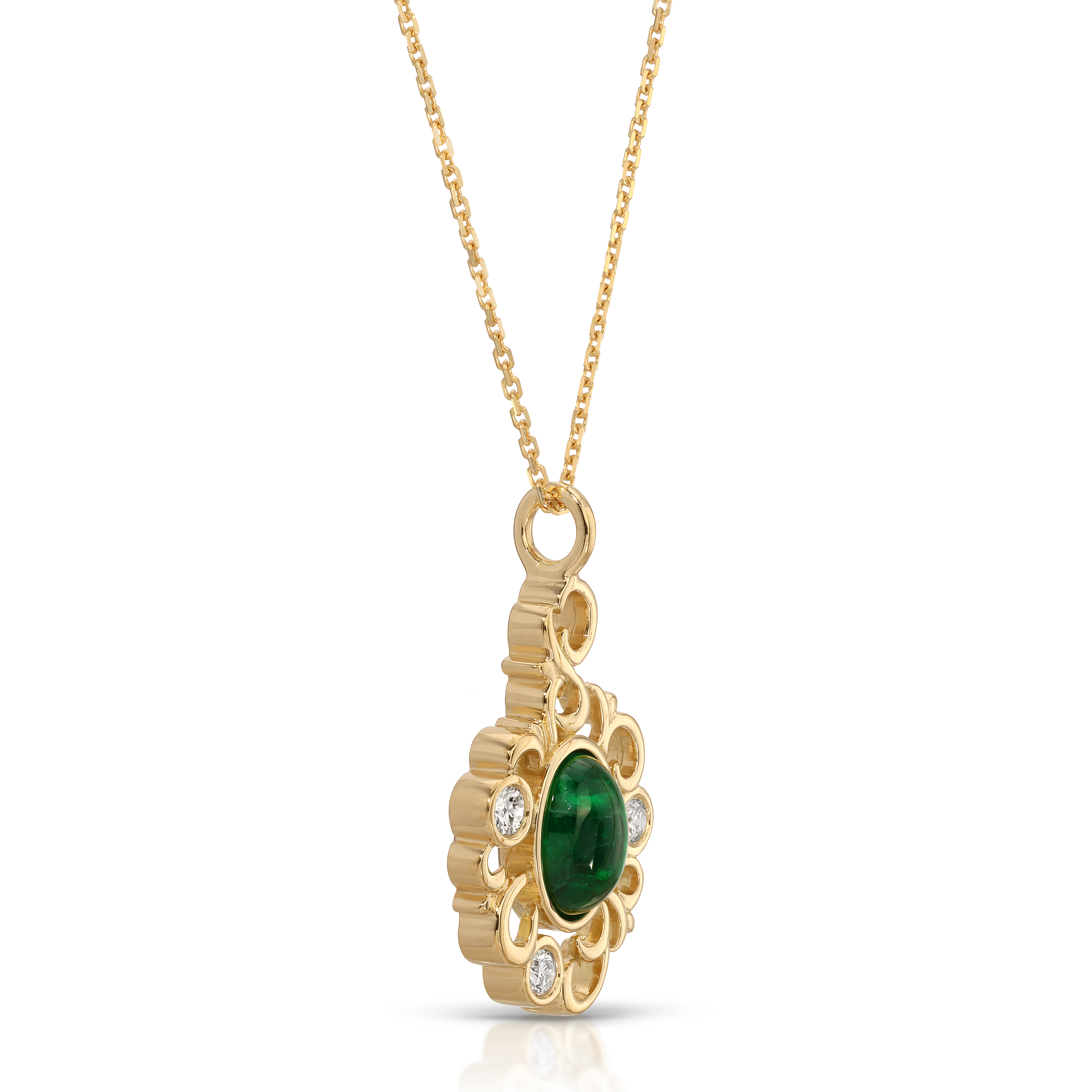 Gold pendant with a green gemstone on a white background