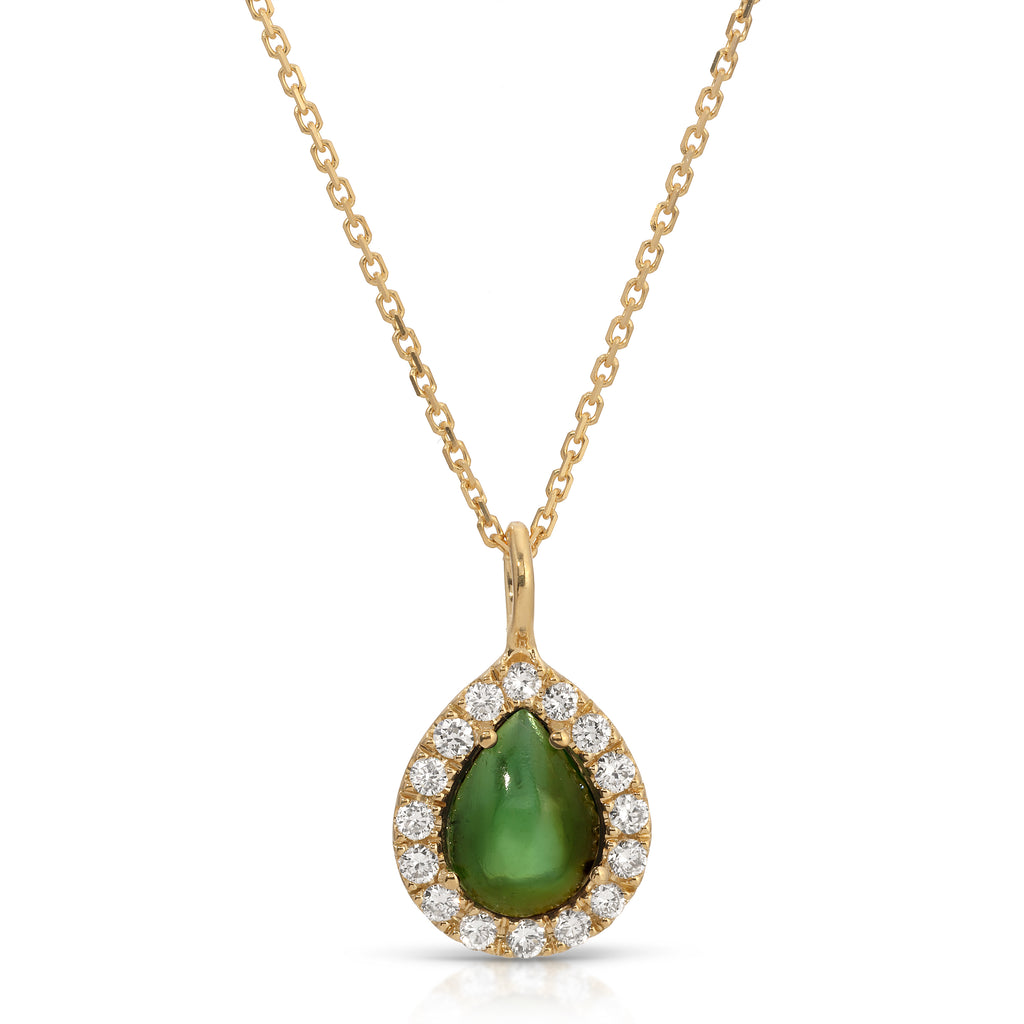 Teardrop-shaped pendant with blue and brown gemstones on a white background