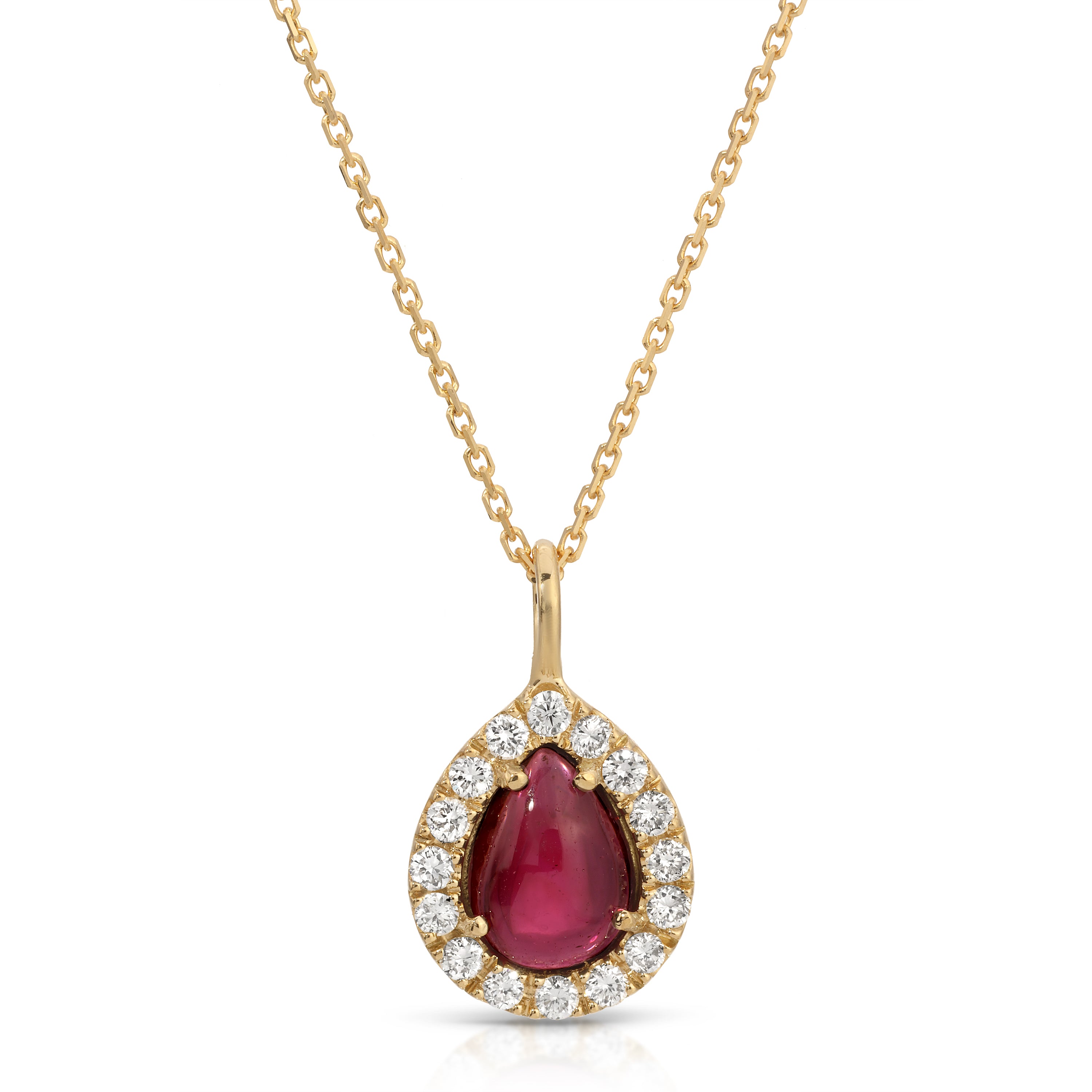 Gold necklace with a teardrop-shaped pendant featuring a red gemstone and clear stones on a white background.