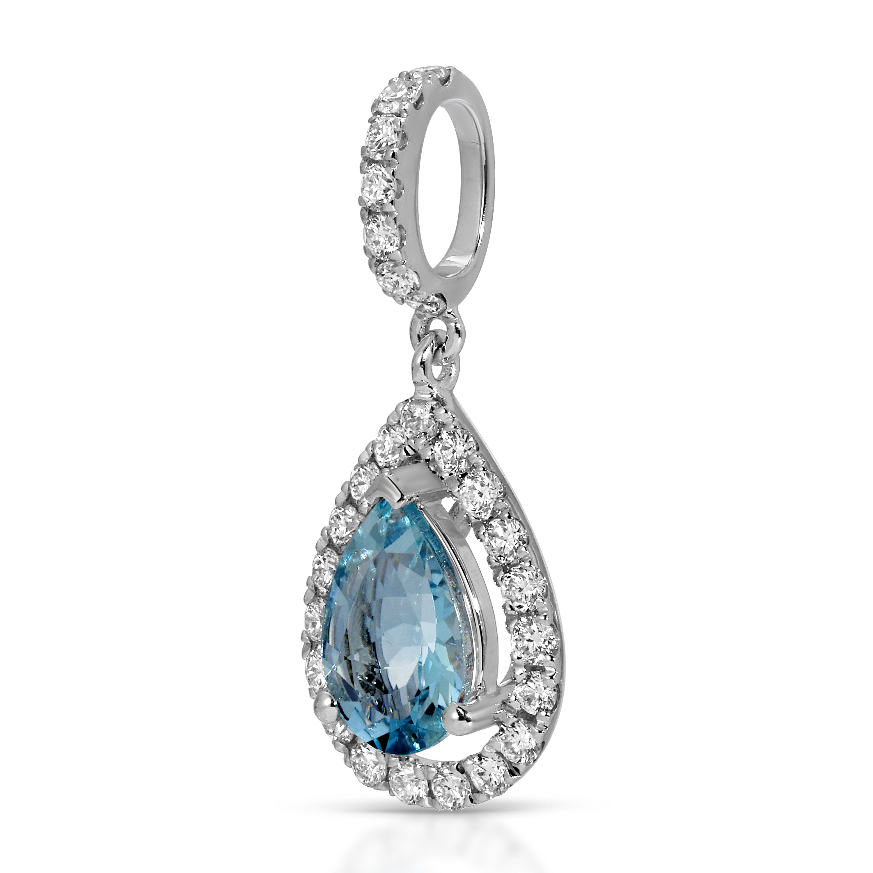Teardrop-shaped pendant with blue gemstone and diamonds on a white background