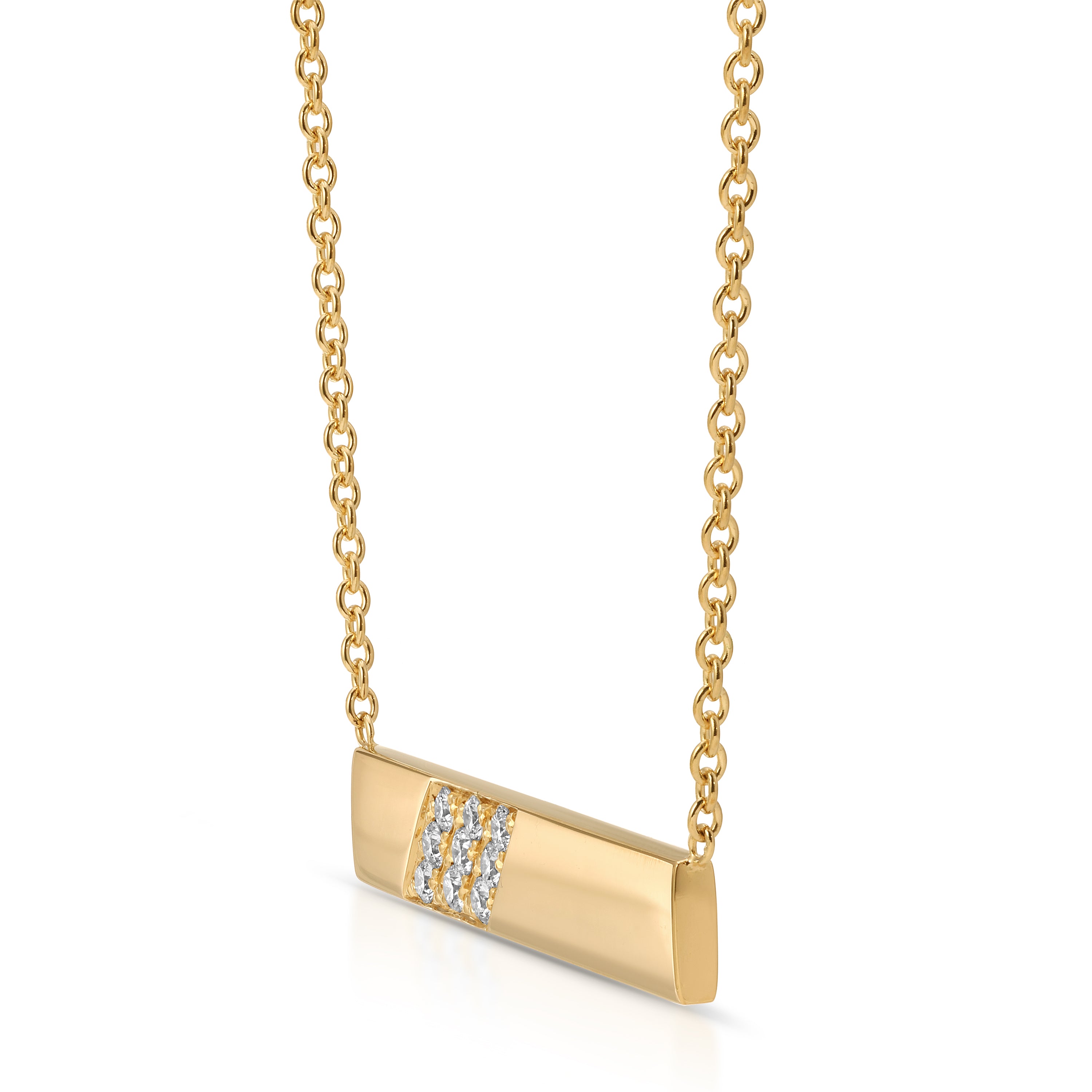 Gold necklace with a bar pendant featuring small diamonds on a white background