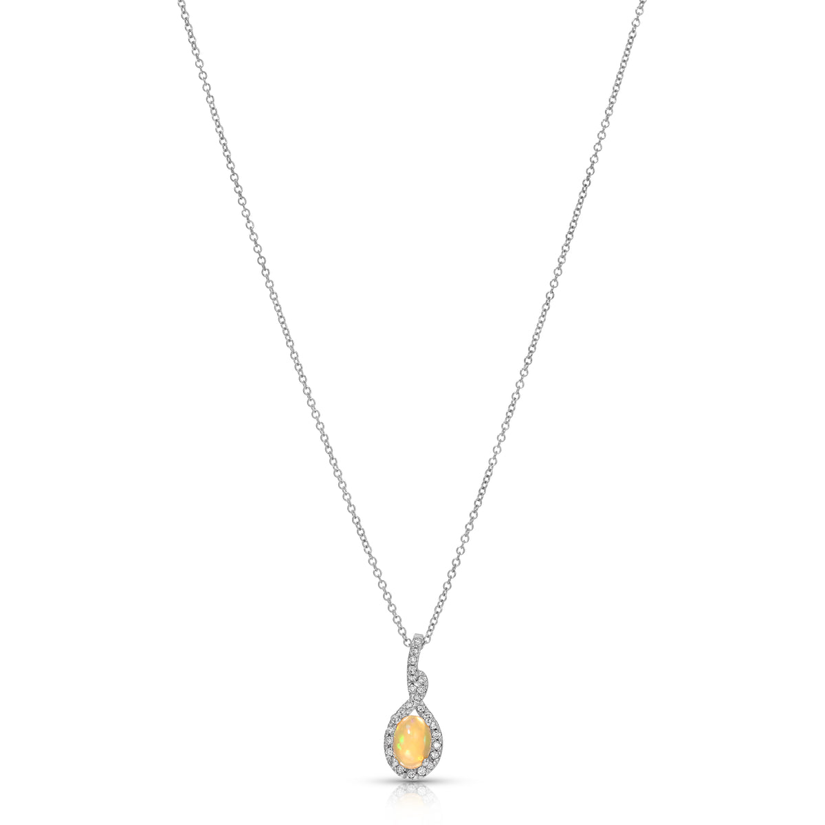 A silver-toned teardrop pendant necklace featuring a warm yellow gemstone surrounded by small clear stones, suspended on a delicate chain against a plain white background.
