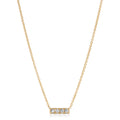 Gold necklace with a bar pendant featuring three diamonds on a white background