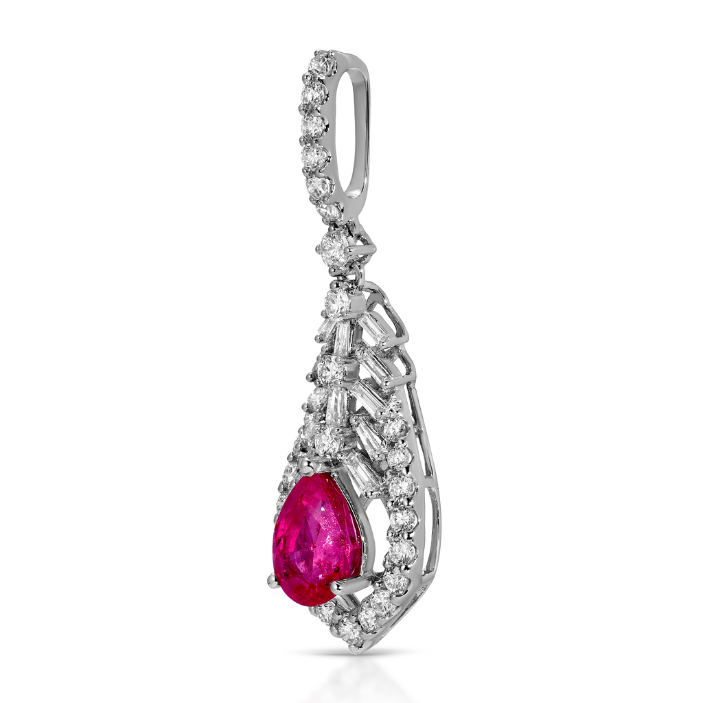 Diamond pendant with a central red gemstone on a white background
